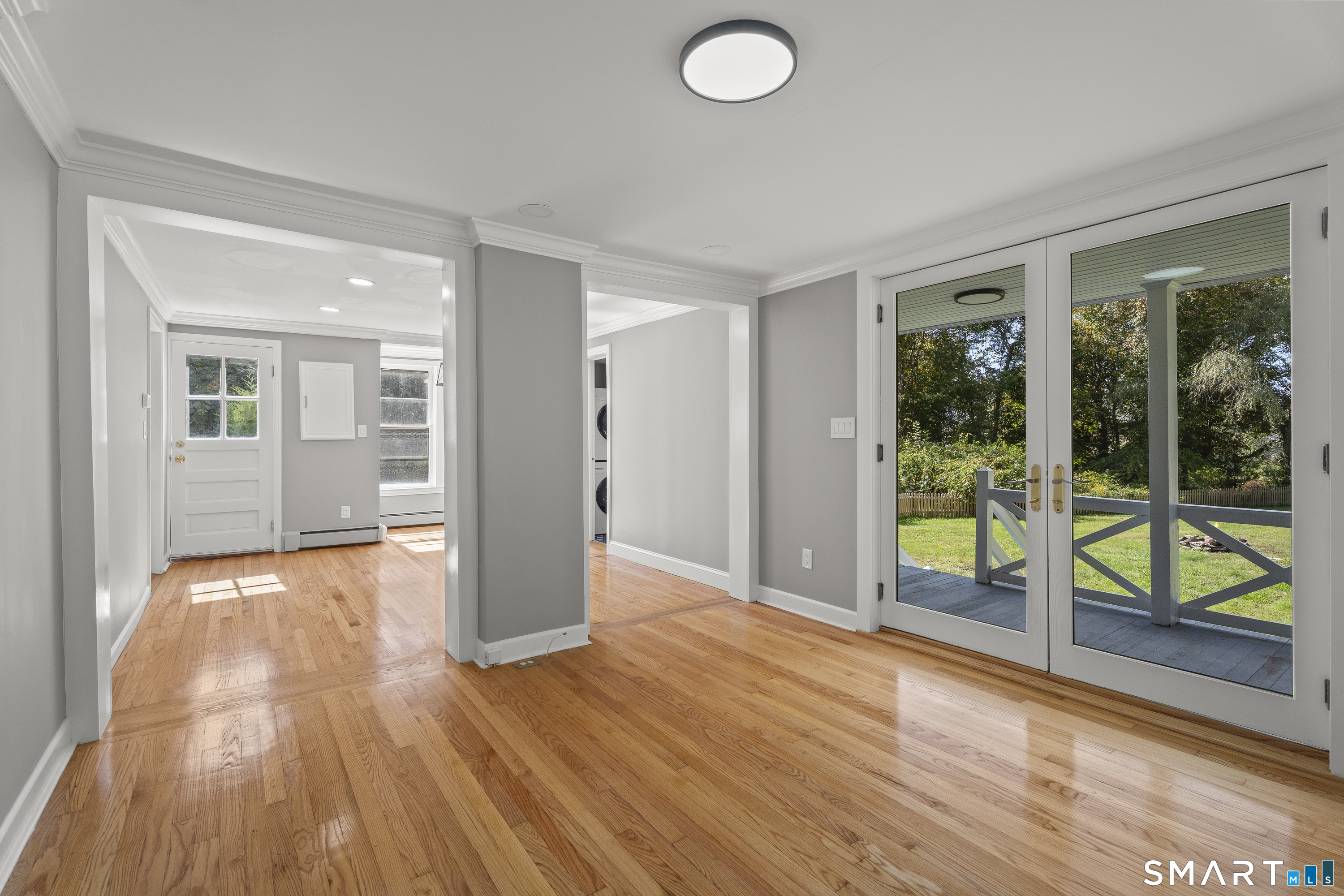52 B Millstone Road West Waterford, CT 06385 - Photo 13 of 31 a view of a livingroom with wooden floor and window