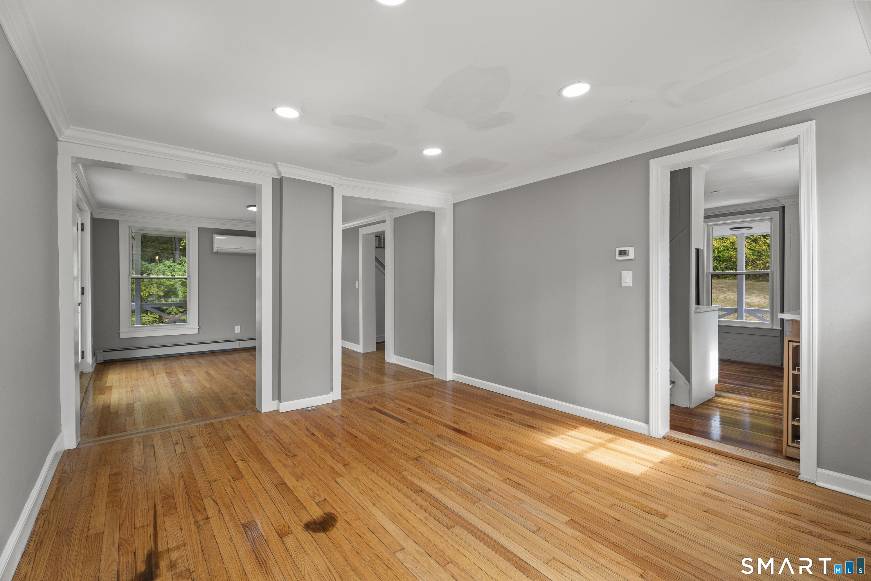 52 B Millstone Road West Waterford, CT 06385 - Photo 18 of 31 a view of empty room with wooden floor