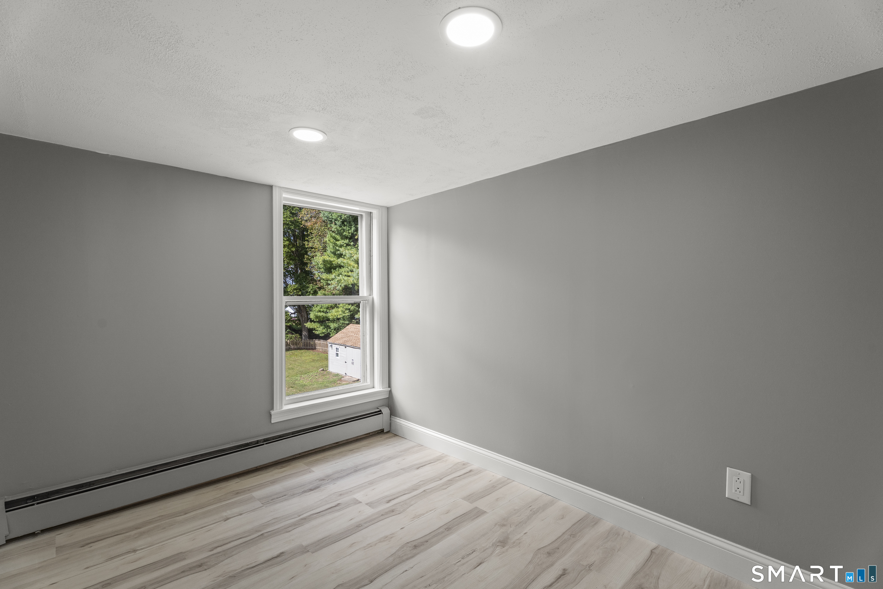 52 B Millstone Road West Waterford, CT 06385 - Photo 23 of 31 a view of an empty room with a window