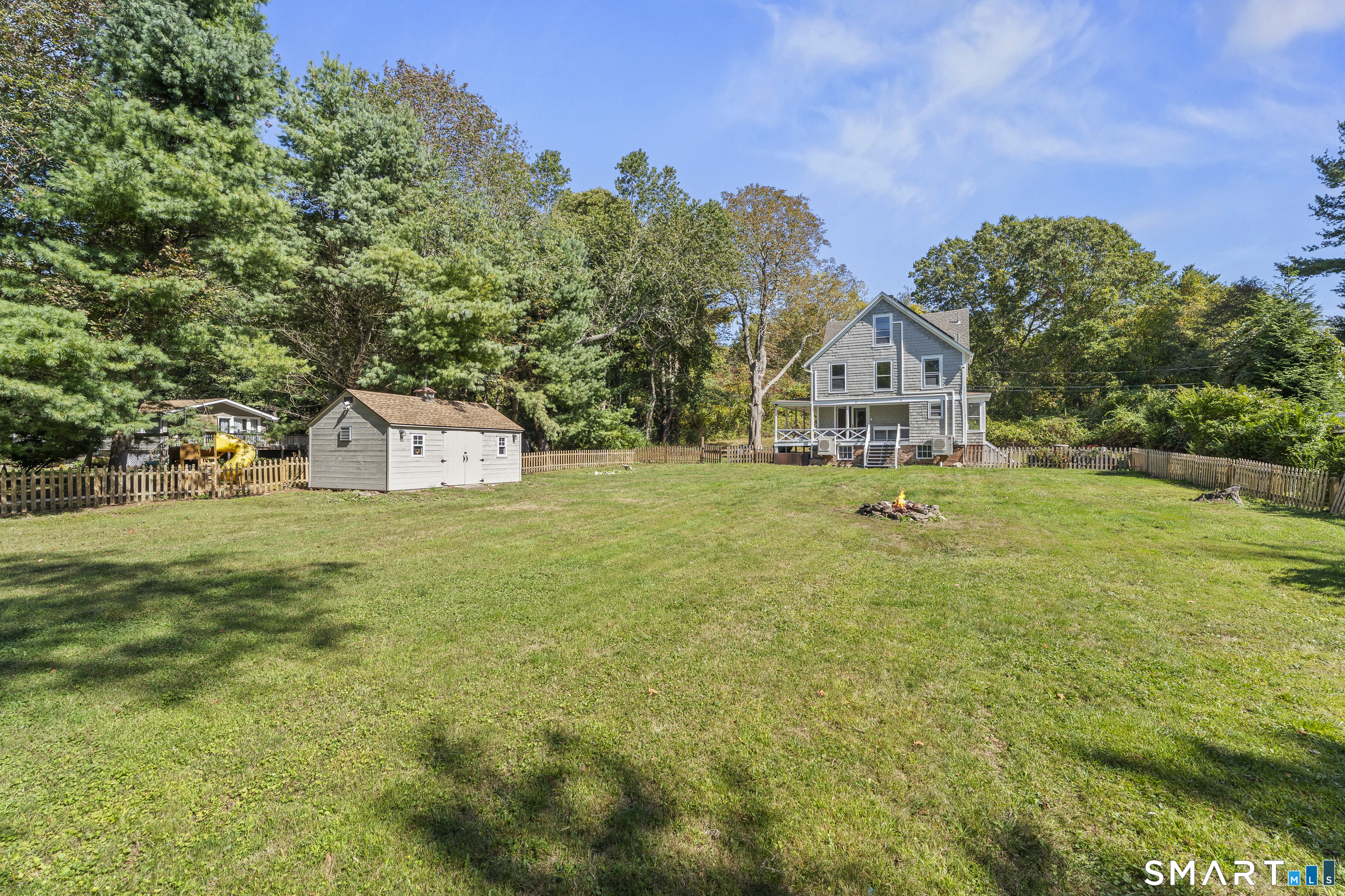 52 B Millstone Road West Waterford, CT 06385 - Photo 6 of 31 a front view of a house with garden