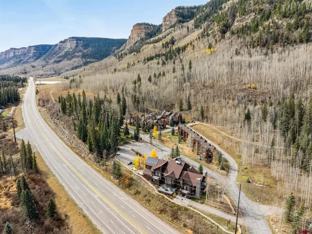 a view of a large with large trees