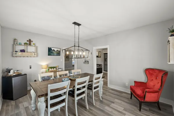 a view of a dining room with furniture