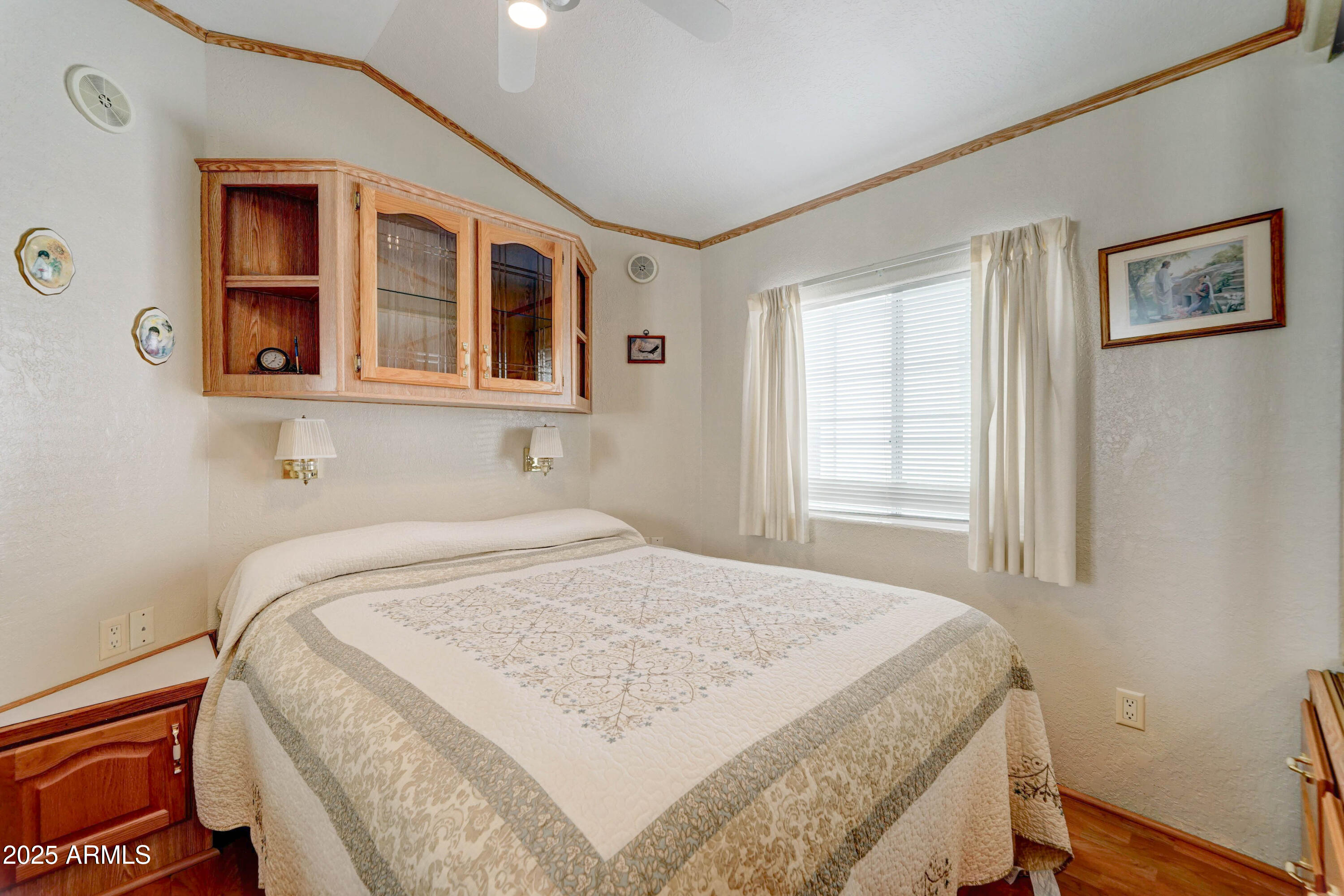 111 South Greenfield Road, Unit 440 Mesa, AZ 85206 - Photo 15 of 31 a bedroom with a bed and a window