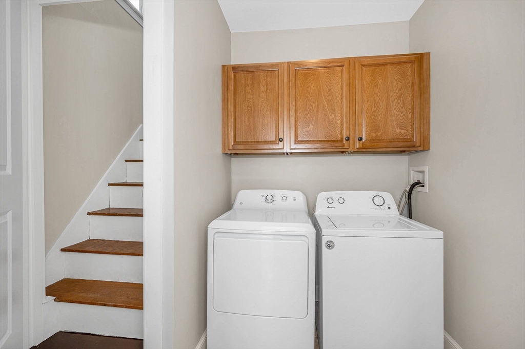 69 Ash Street Reading, MA 01867 - Photo 19 of 29 a utility room with dryer and washer