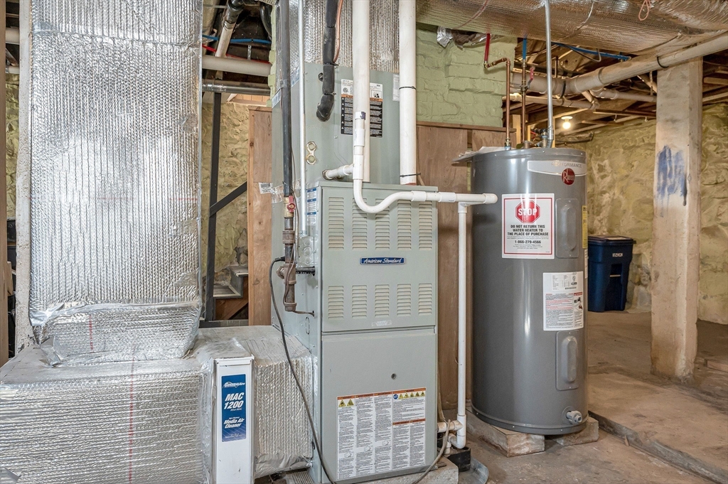 69 Ash Street Reading, MA 01867 - Photo 22 of 29 a bathroom with a shower