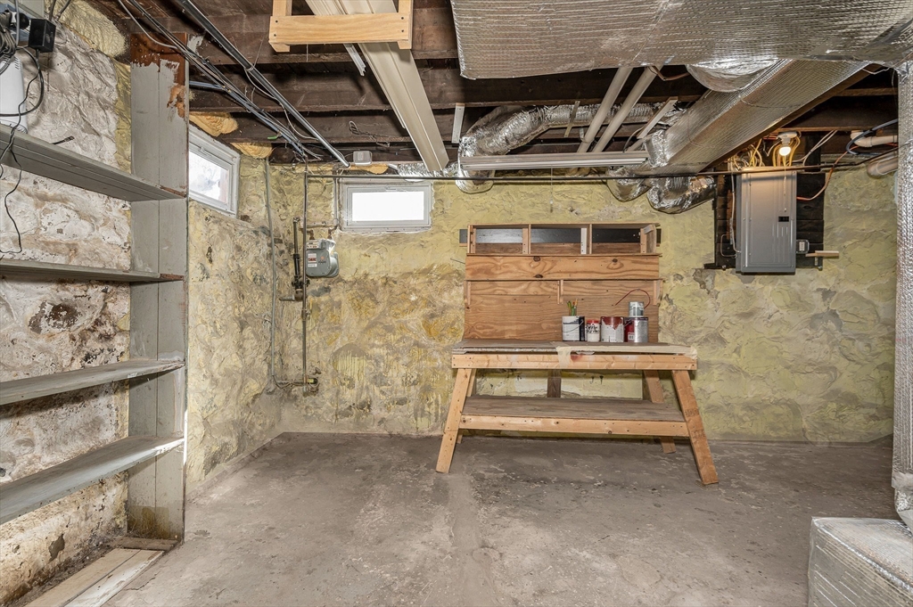 69 Ash Street Reading, MA 01867 - Photo 23 of 29 a view of room with stairs