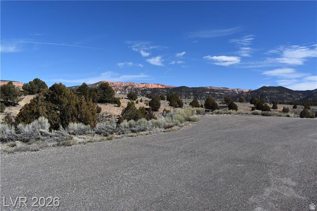 1825 Eagle Ridge Circle, Unit 15 Hatch, UT 84735 - Photo 8 of 33 View of asphalt road featuring a mountain view