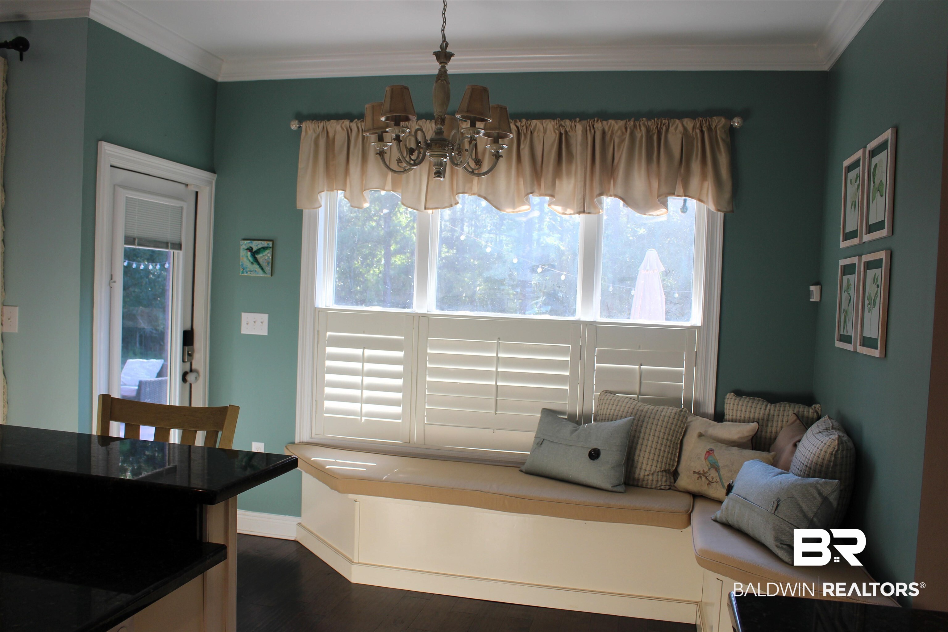 41416 Davis Duck Road Bay Minette, AL 36507 - Photo 34 of 72 Interior space featuring dark hardwood / wood-style floors, a chandelier, a healthy amount of sunlight, and ornamental molding