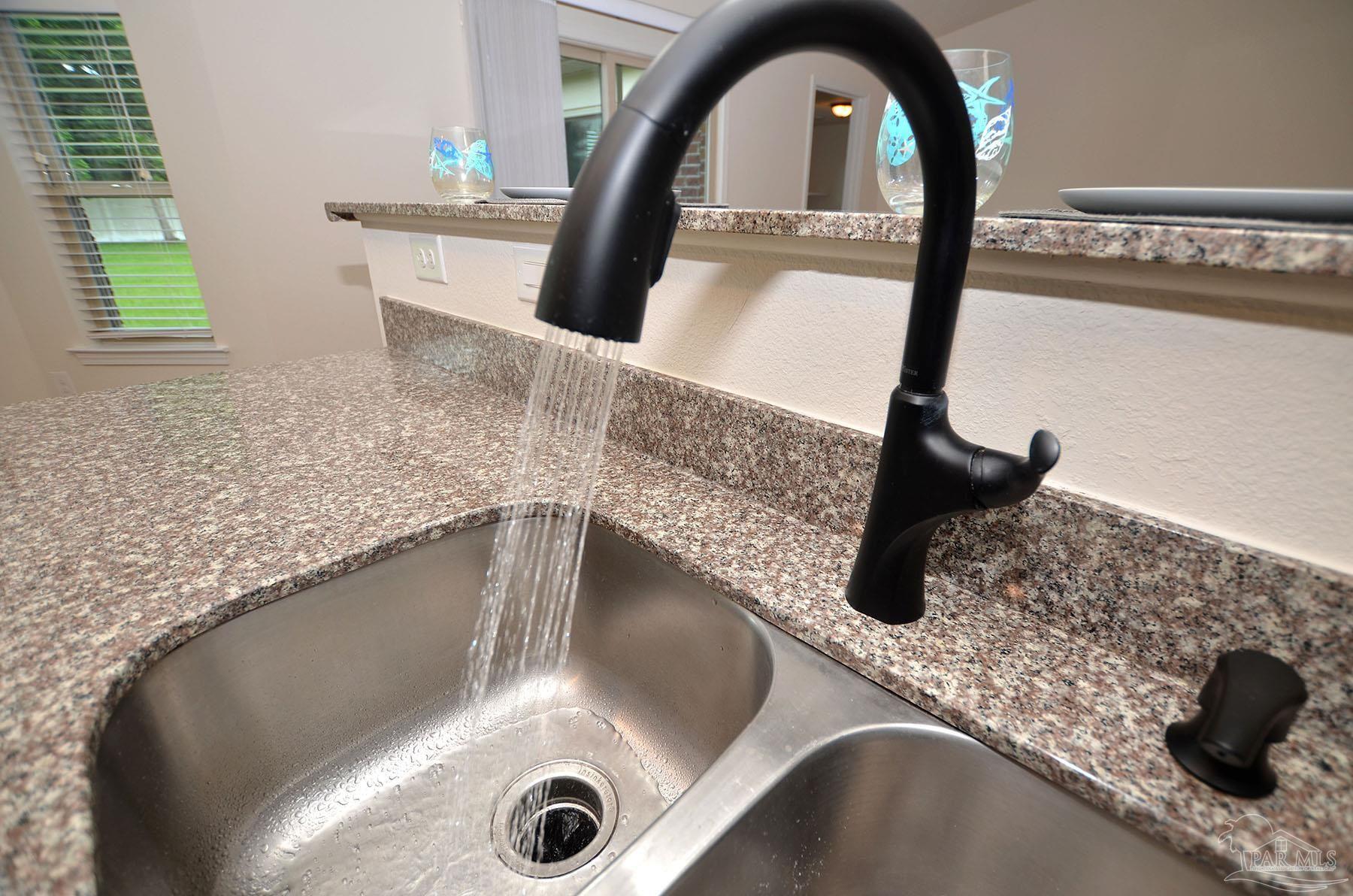 5709 Mill Stream Way Pace, FL 32571 - Photo 16 of 48 a close view of sink