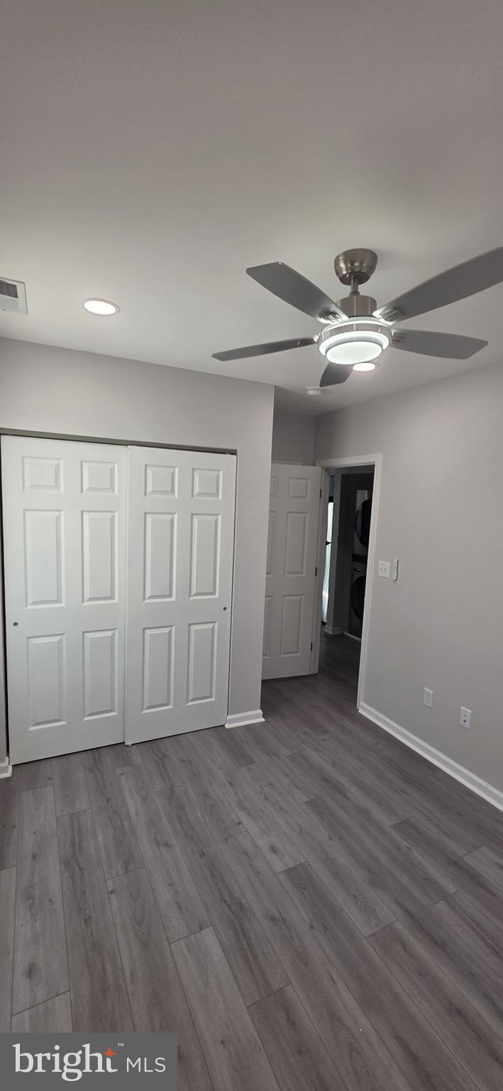 1400 Staples Street Northeast, Unit 1 Washington, DC 20002 - Photo 4 of 13 a view of an empty room with wooden floor