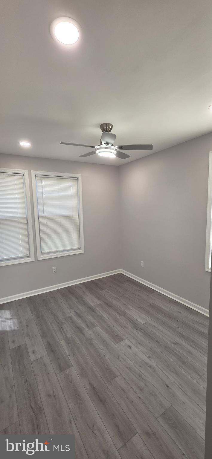 1400 Staples Street Northeast, Unit 1 Washington, DC 20002 - Photo 5 of 13 wooden floor in an empty room