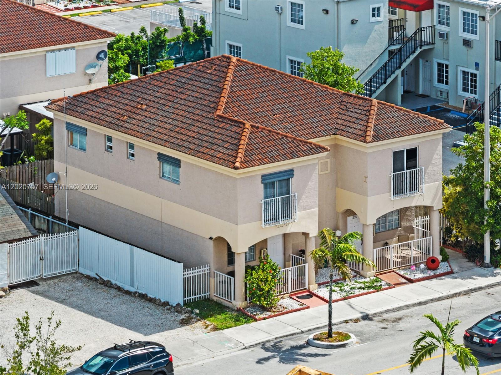 255 East 3rd Street, Unit 1 Hialeah, FL 33010 - Photo 35 of 38 a front view of a house with garden