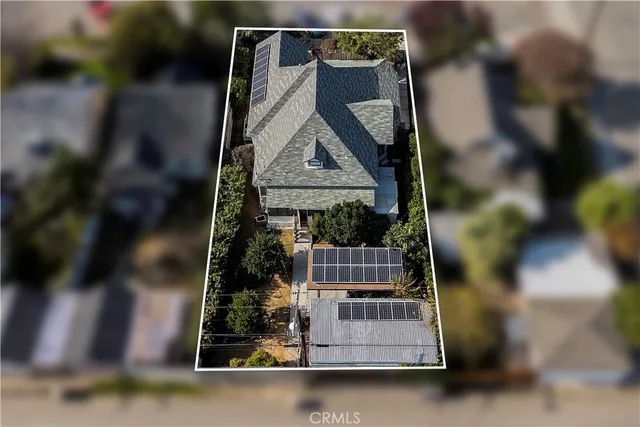 a view of water heater room with windows