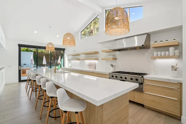 a bedroom with a bed and a mirror