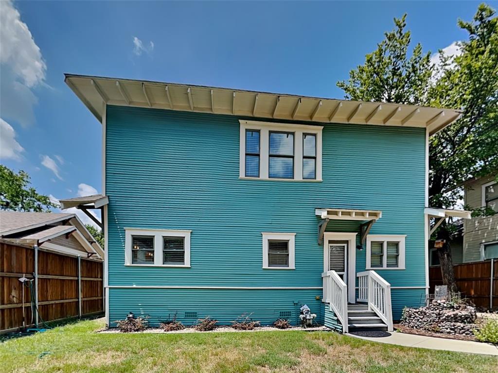 5536 Tremont Street Dallas, TX 75214 - Photo 21 of 21 a front view of a house with a yard