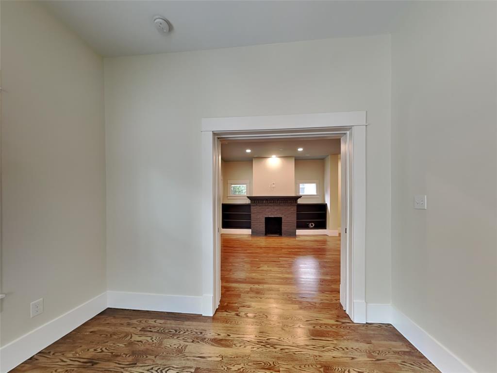 5536 Tremont Street Dallas, TX 75214 - Photo 4 of 21 a view of a living room with hardwood floor