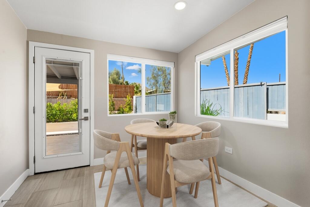38855 Paradise Way Cathedral City, CA 92234 - Photo 16 of 67 a dining room with furniture and window