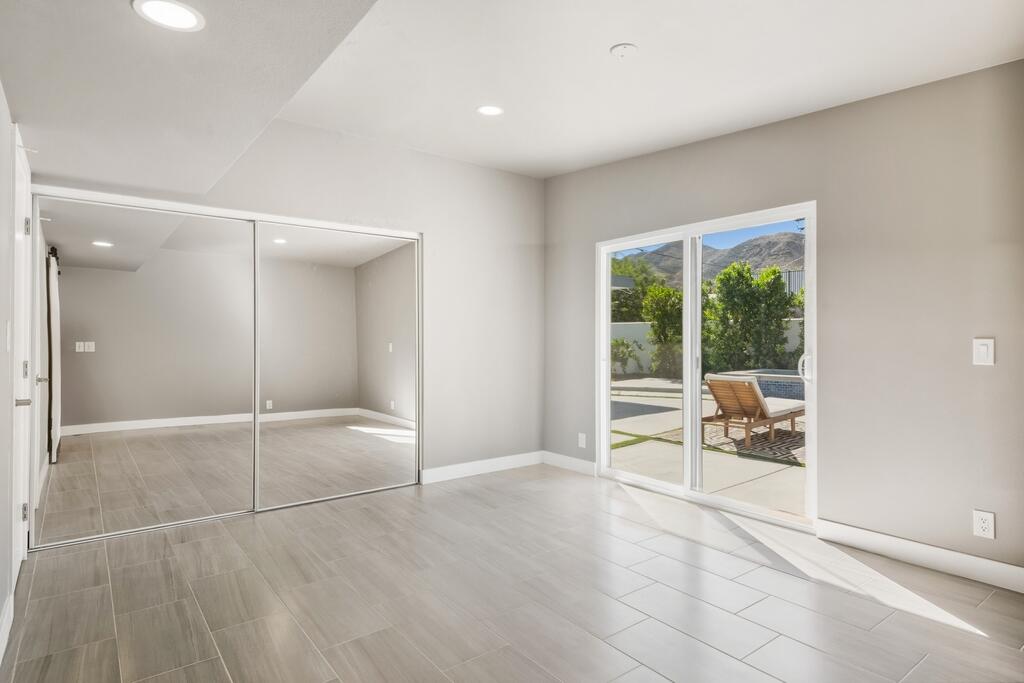 38855 Paradise Way Cathedral City, CA 92234 - Photo 22 of 67 a view of an empty room with a window
