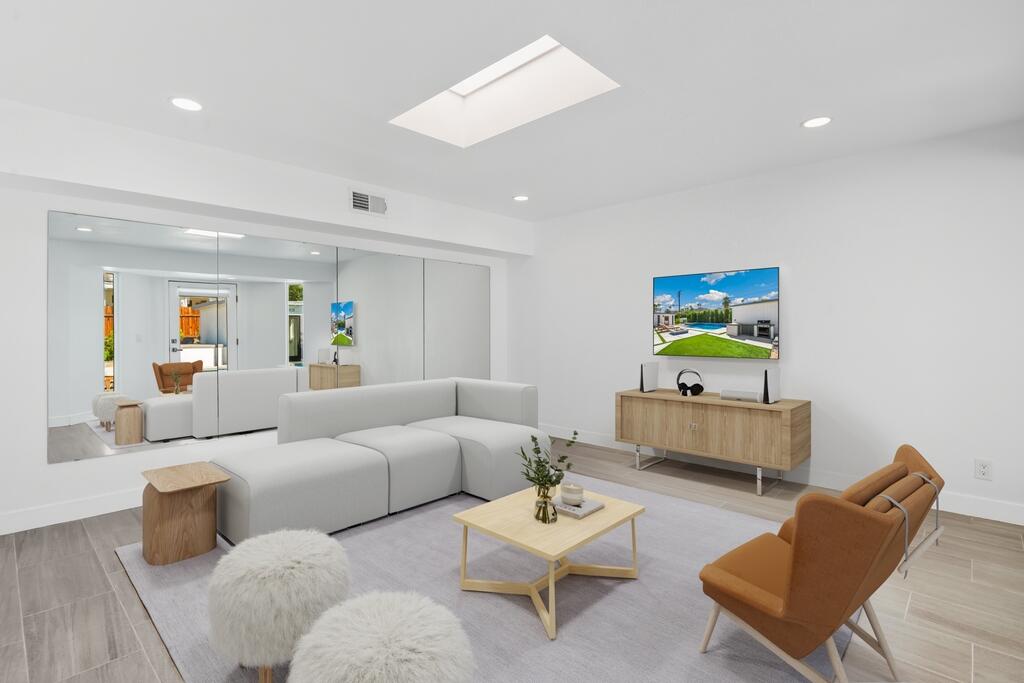 38855 Paradise Way Cathedral City, CA 92234 - Photo 37 of 67 a living room with furniture and a wooden floor