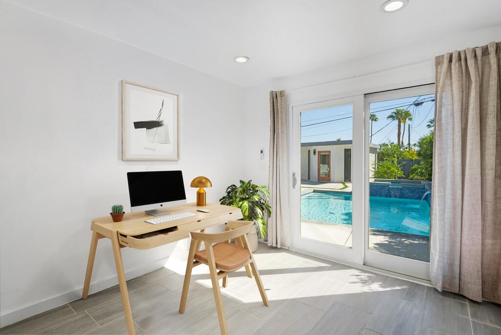 38855 Paradise Way Cathedral City, CA 92234 - Photo 41 of 67 a work room with furniture and a potted plant