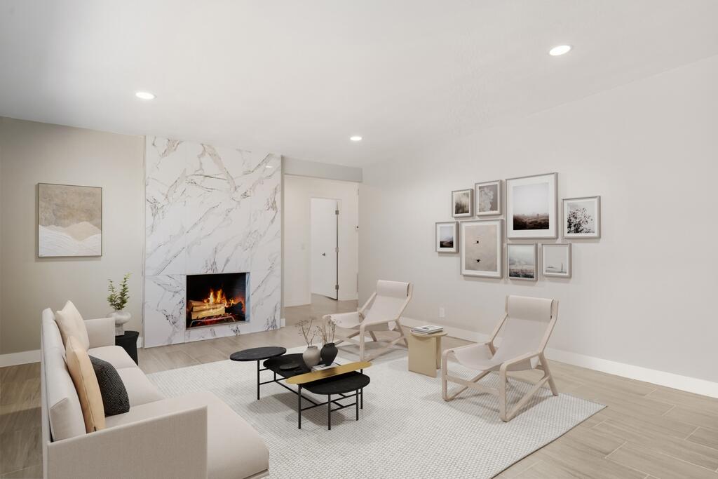 38855 Paradise Way Cathedral City, CA 92234 - Photo 6 of 67 a living room with furniture and a fireplace