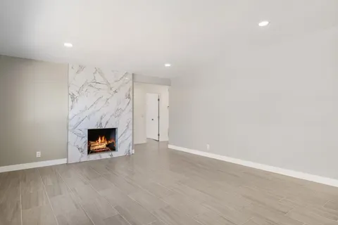 a living room with a fireplace