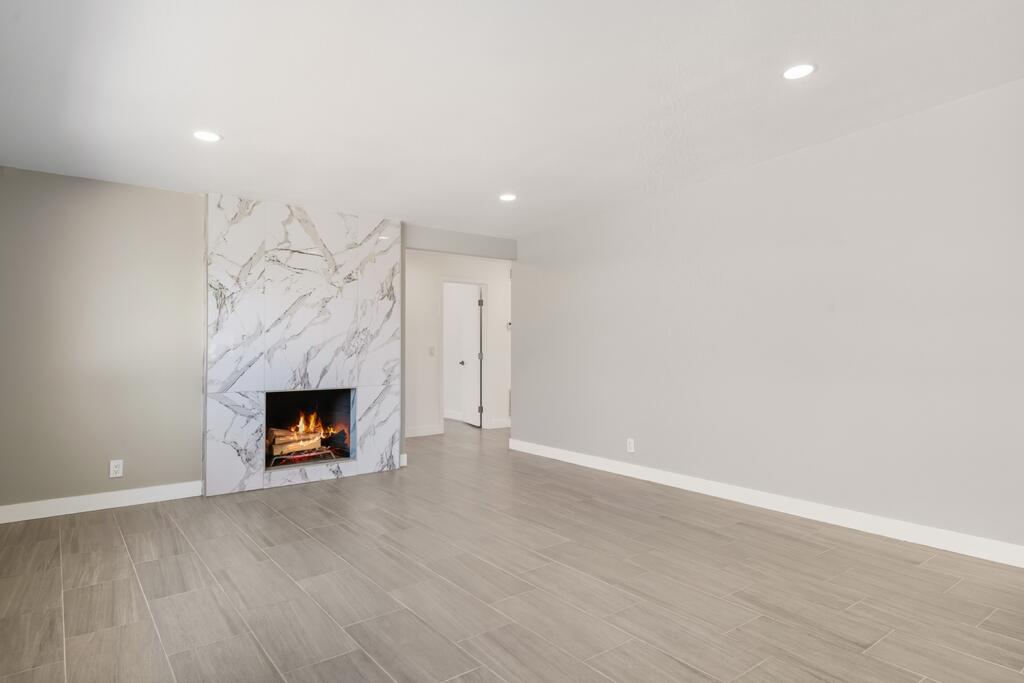 38855 Paradise Way Cathedral City, CA 92234 - Photo 7 of 67 a view of an empty room with a fireplace