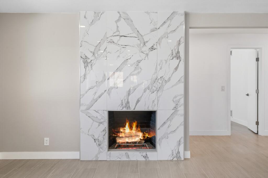 38855 Paradise Way Cathedral City, CA 92234 - Photo 10 of 67 a living room with a fireplace