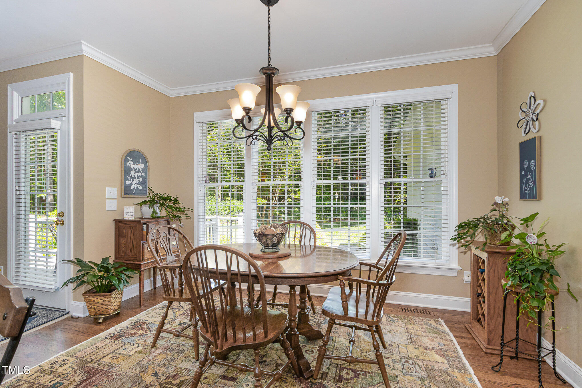 8304 Epping Forest Way Wake Forest, NC 27587 - Photo 17 of 41 a view of a dining room with furniture window and outside view
