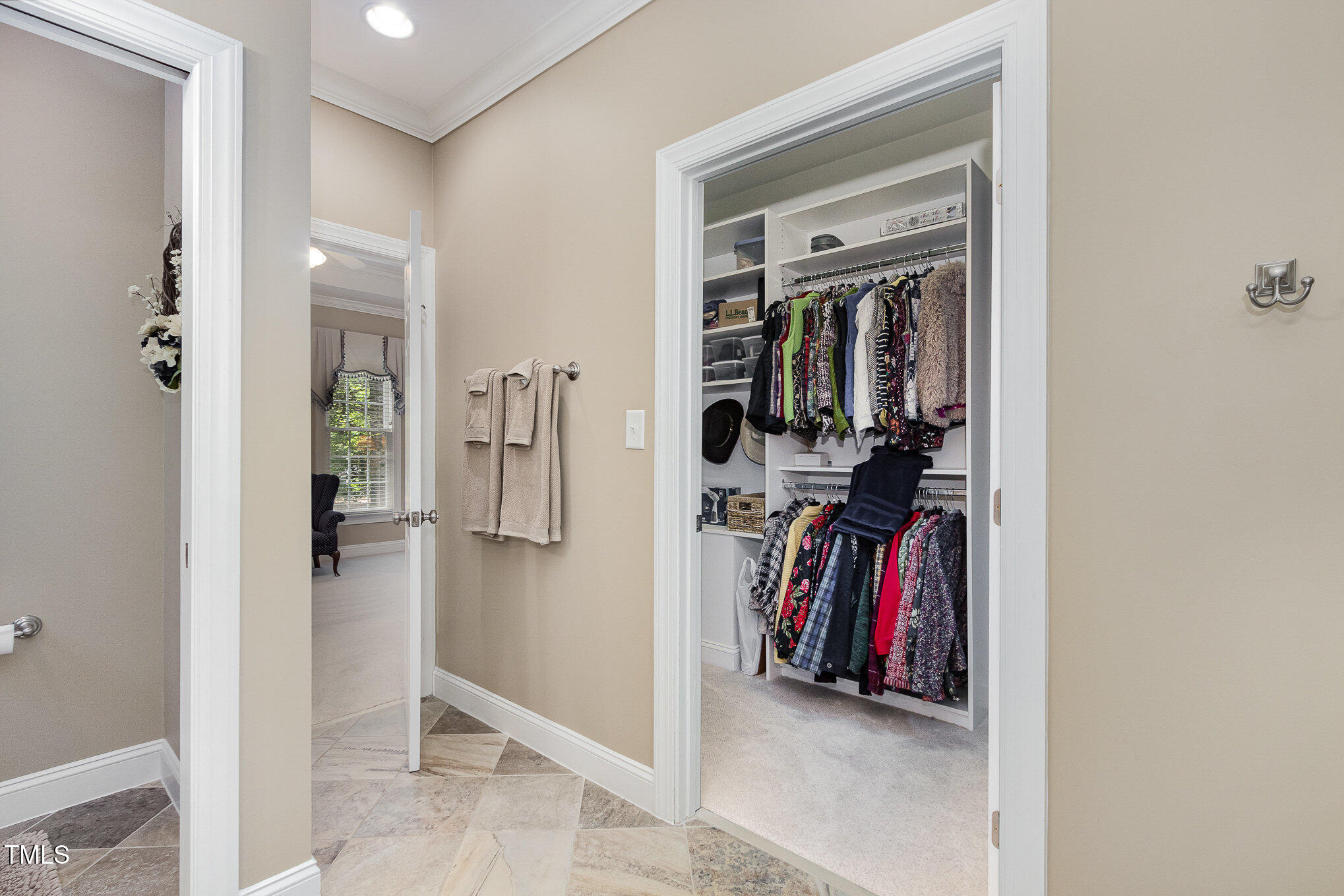 8304 Epping Forest Way Wake Forest, NC 27587 - Photo 24 of 41 a view of walk in closet with clothes and shoes