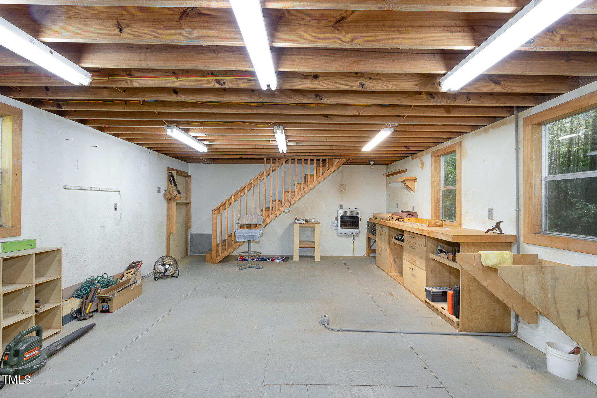 8304 Epping Forest Way Wake Forest, NC 27587 - Photo 33 of 41 a kitchen with stainless steel appliances granite countertop a sink and a stove