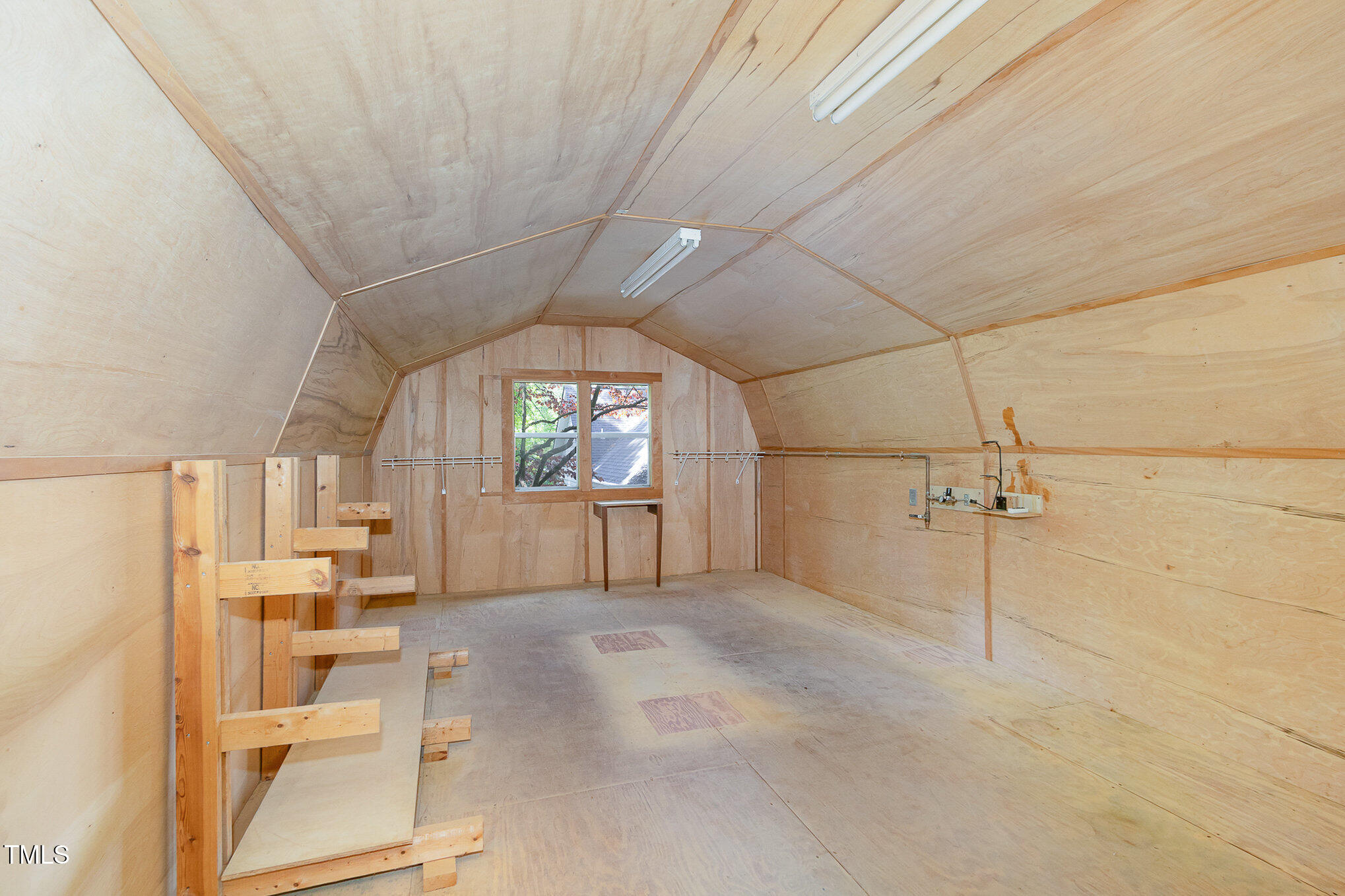 8304 Epping Forest Way Wake Forest, NC 27587 - Photo 34 of 41 a view of a big room with a windows and wooden floor