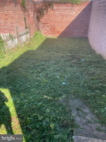 a view of an outdoor space and a yard