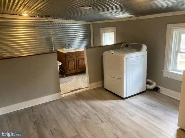 a utility room with washer and dryer