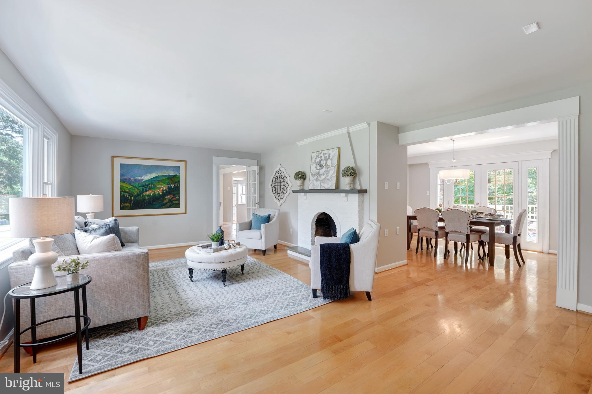 922 Hunt Road Radnor, PA 19008 - Photo 13 of 59 a living room with furniture a table and a window