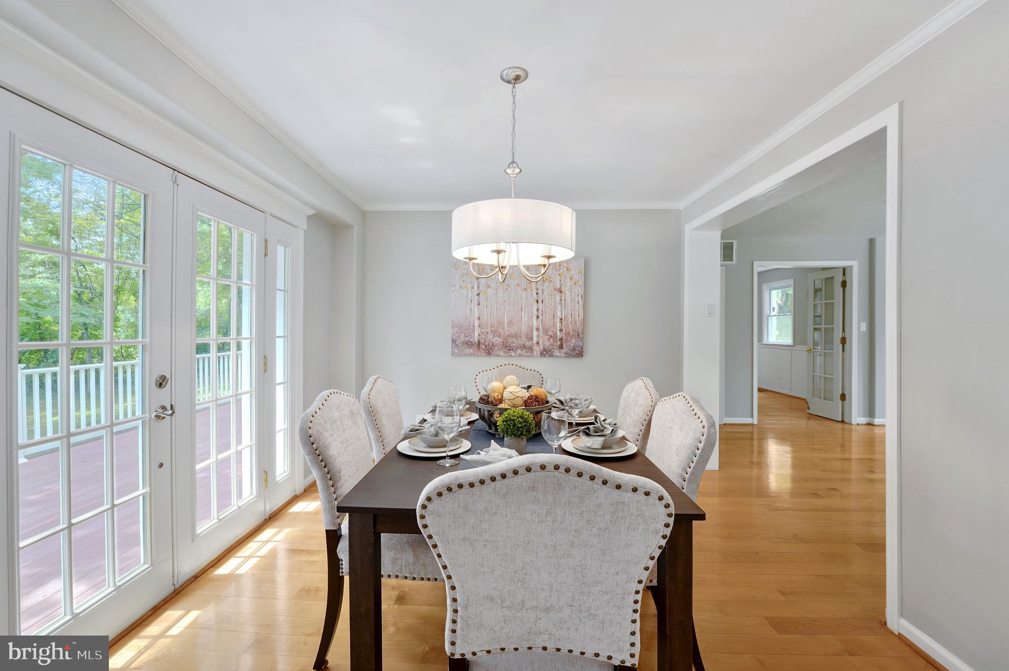 922 Hunt Road Radnor, PA 19008 - Photo 15 of 59 a dining room with furniture and wooden floor