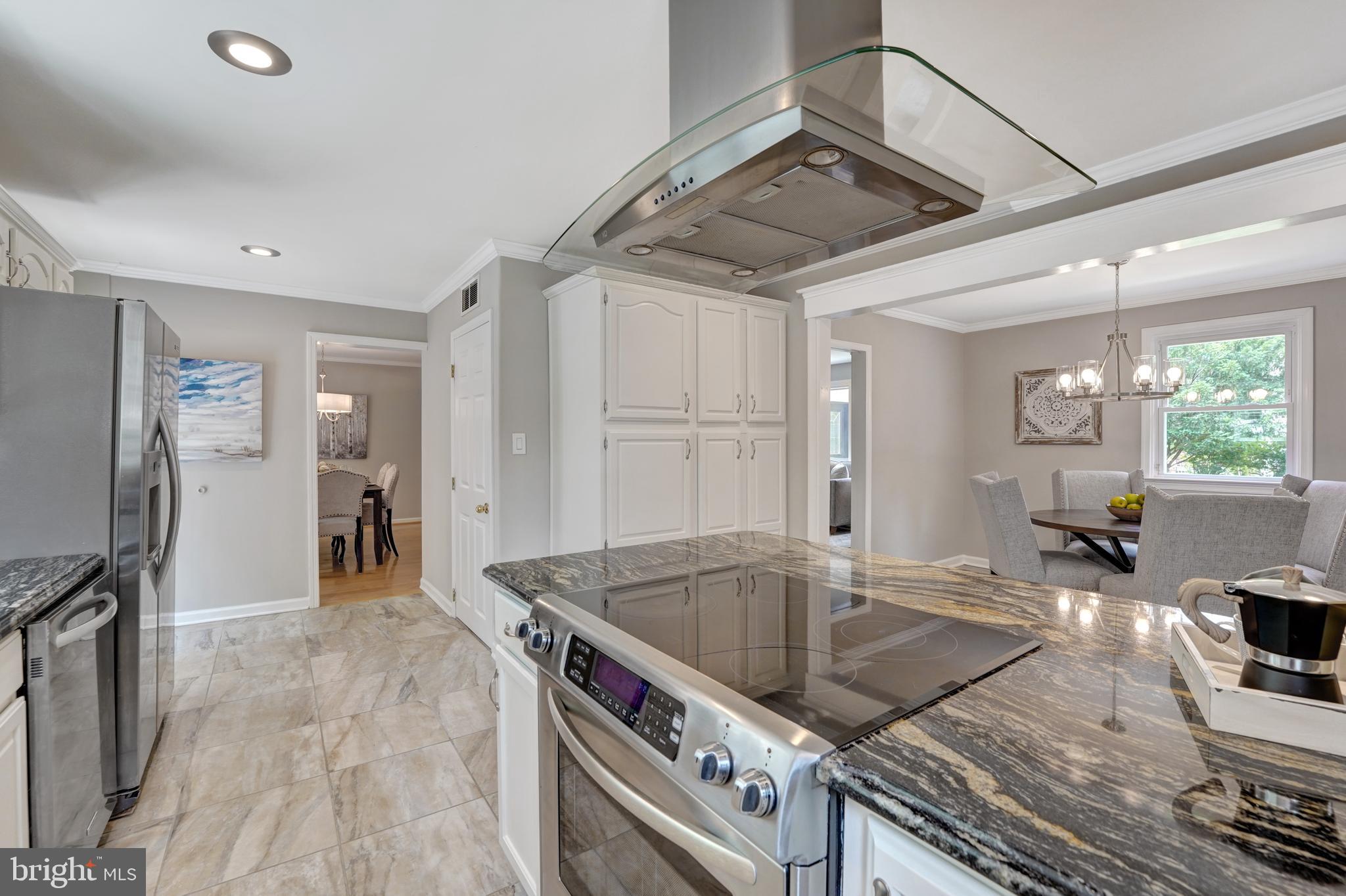 922 Hunt Road Radnor, PA 19008 - Photo 18 of 59 a kitchen with stainless steel appliances granite countertop a sink stove and refrigerator