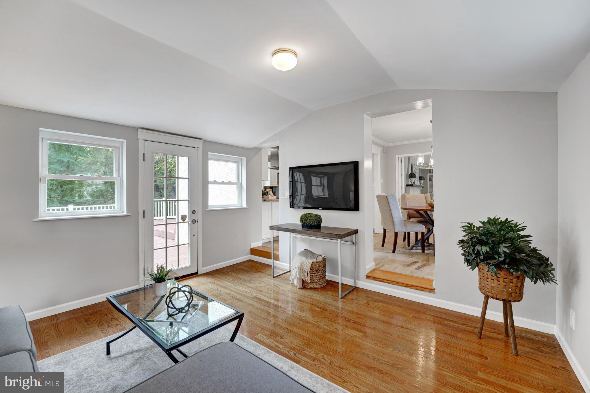 922 Hunt Road Radnor, PA 19008 - Photo 27 of 59 a living room with furniture and a flat screen tv