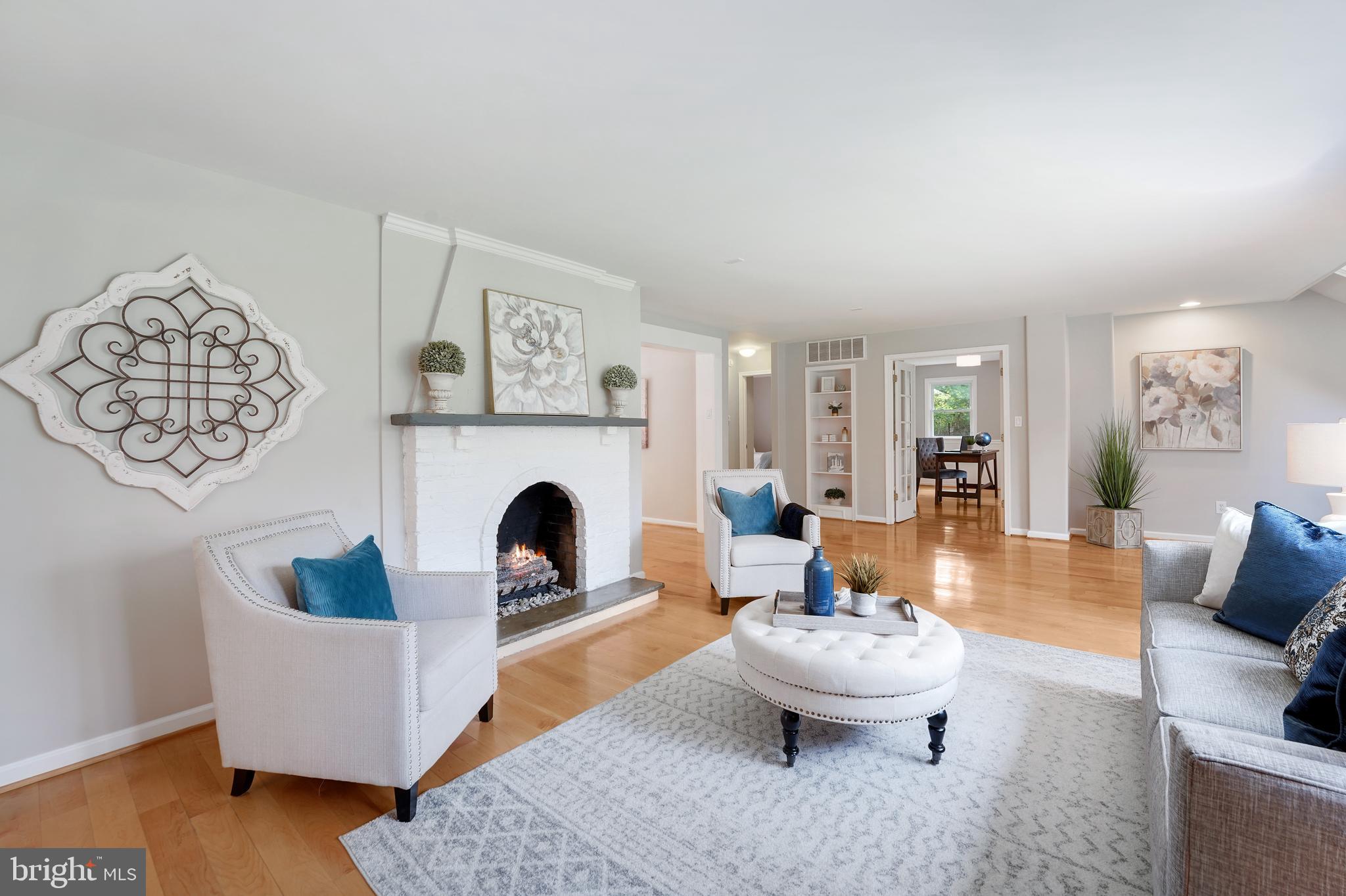922 Hunt Road Radnor, PA 19008 - Photo 4 of 59 a living room with furniture and a fireplace