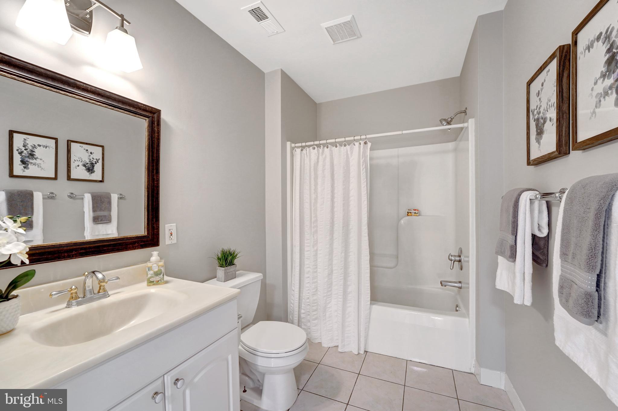 922 Hunt Road Radnor, PA 19008 - Photo 46 of 59 a bathroom with a sink toilet and shower