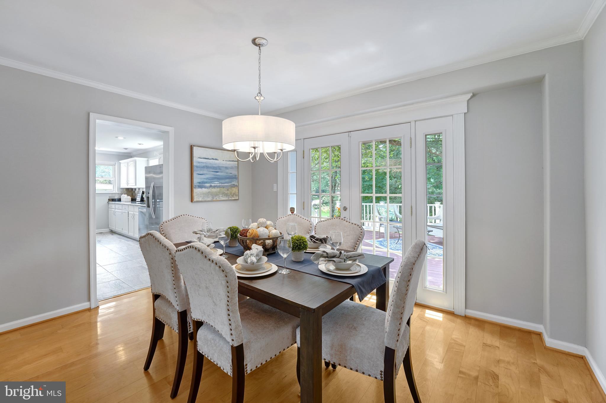 922 Hunt Road Radnor, PA 19008 - Photo 6 of 59 a view of a dining room with furniture window and wooden floor