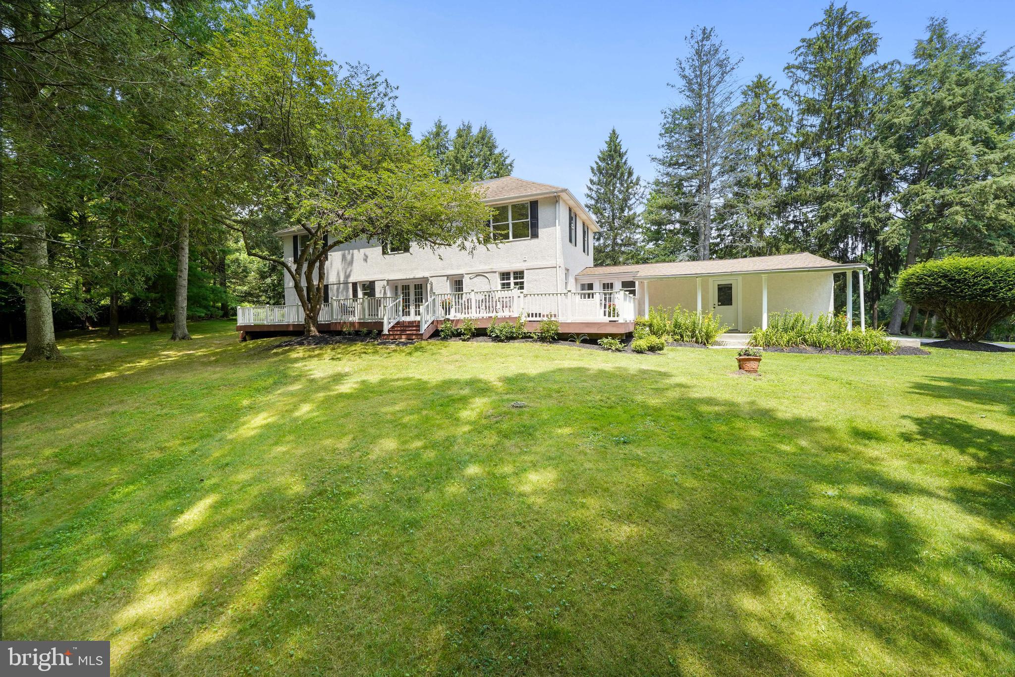 922 Hunt Road Radnor, PA 19008 - Photo 51 of 59 a view of a house with a yard and sitting area