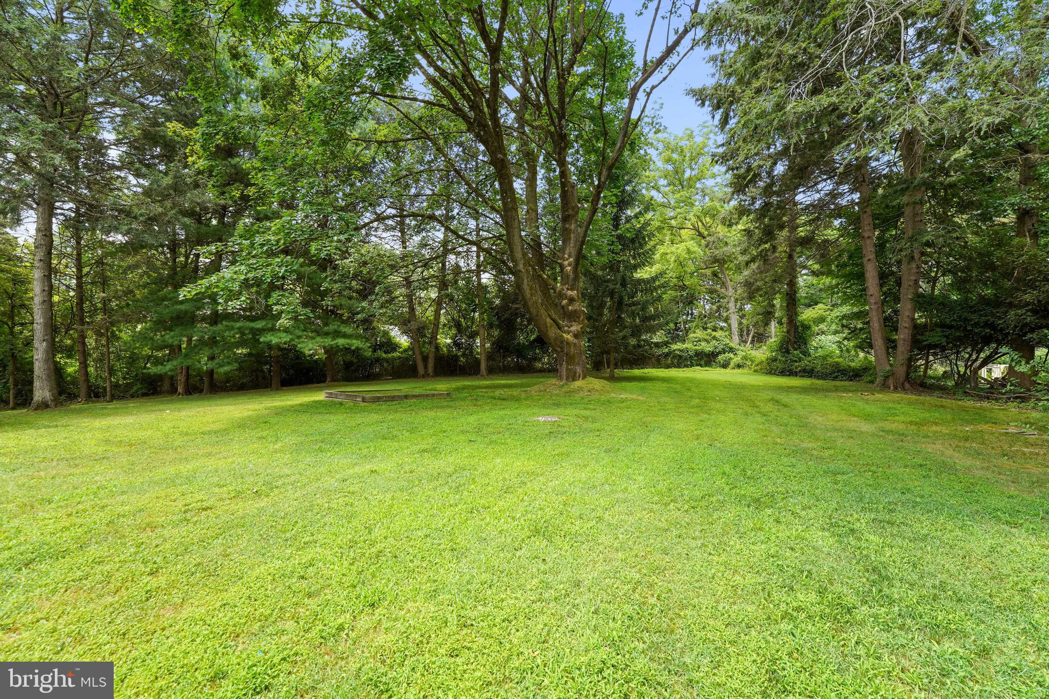 922 Hunt Road Radnor, PA 19008 - Photo 55 of 59 a view of green field with trees in the background