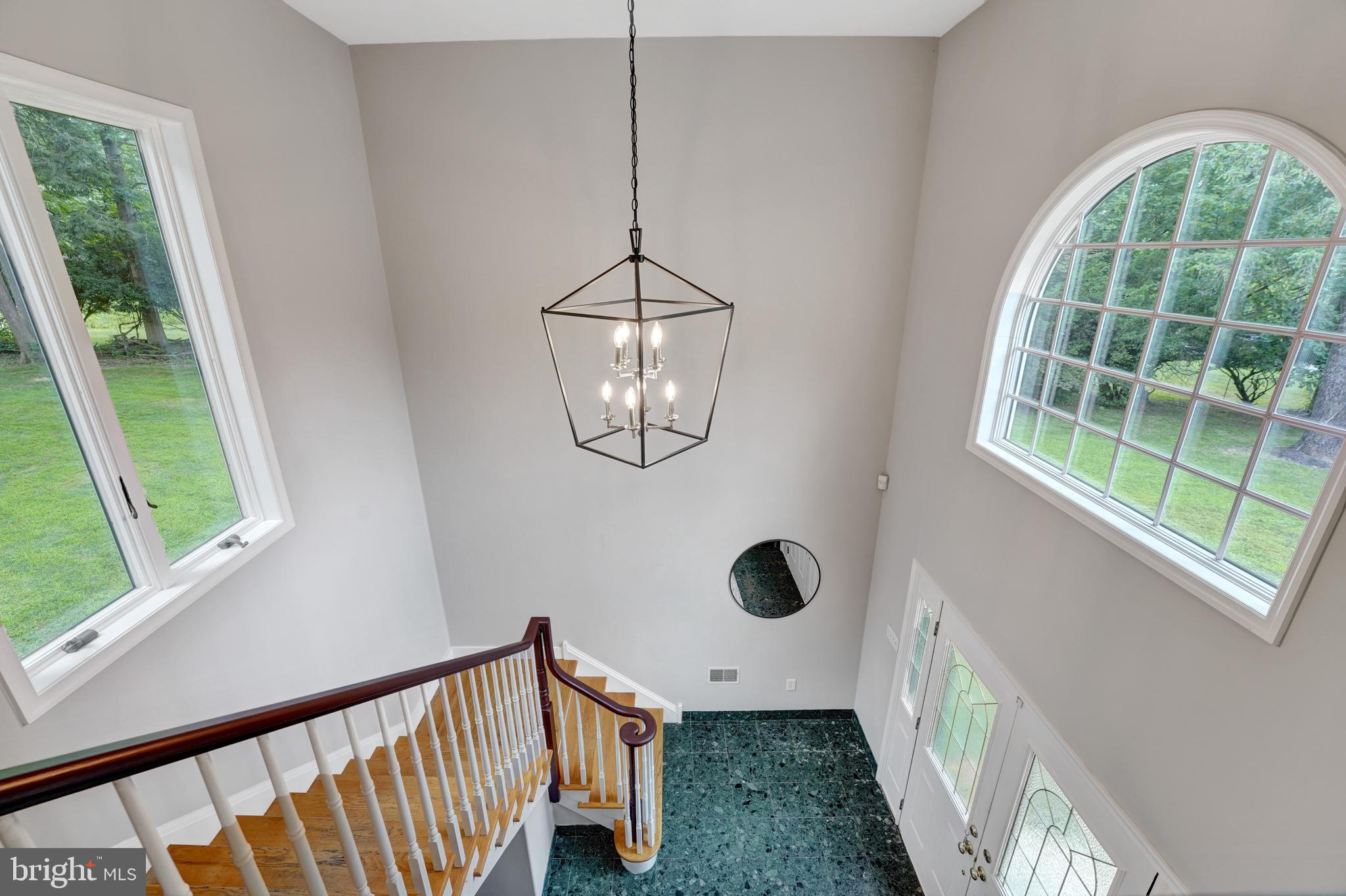 922 Hunt Road Radnor, PA 19008 - Photo 9 of 59 a view of entryway with wooden floor and windows