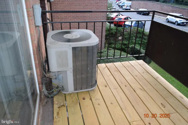 a balcony view with a fountain