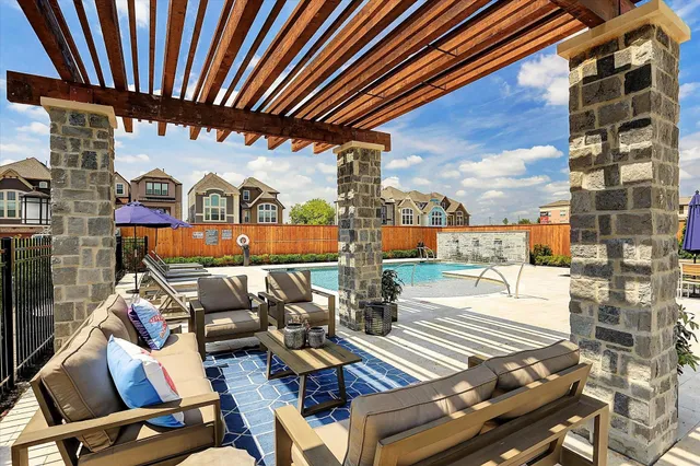 a view of a chairs and table in the patio