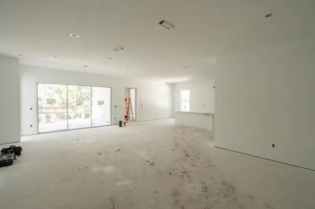 a view of a bedroom with window