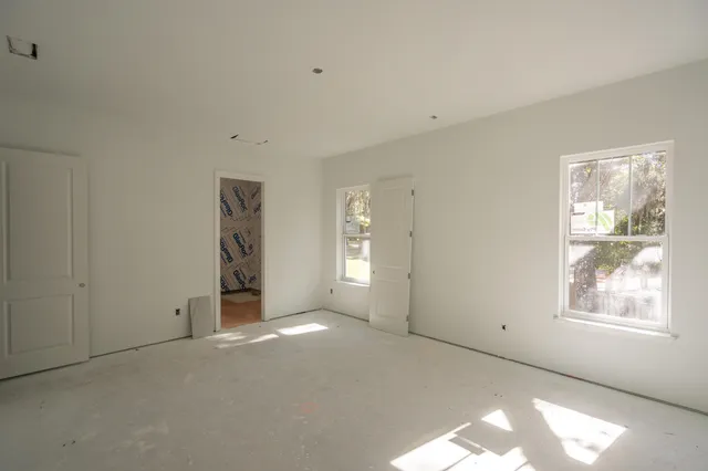 an empty room with windows