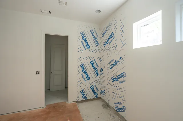 an empty room with windows