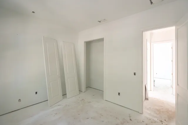 a bathroom with a bathtub and a window